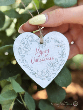 White hanging heart-shaped wooden gift tag keepsake saying 'Happy Valentines' - Eco-friendly gift wrap from English Roses