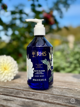 Hand Wash - White Blooms Rose and Peony RHS The Flower Show Collection - A luxurious deep blue bottle with decorative artwork