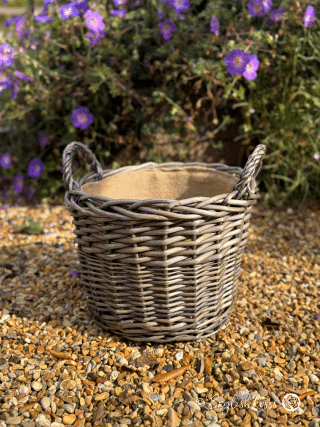 Willow Basket Planters Large L - Empty patio willow basket on a sunny patio area